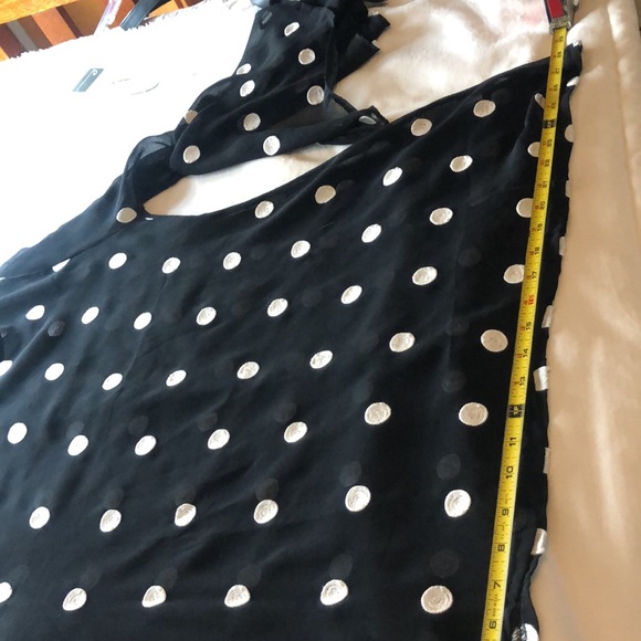 Sheer black and off white flared top with flared split sleeves. - Picture 10 of 11